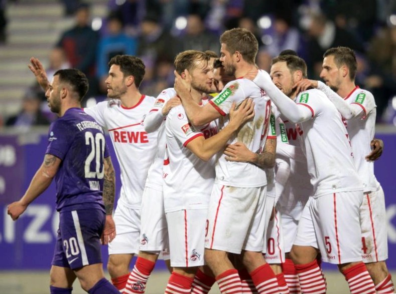 1. Fc koln back on top after win in aue